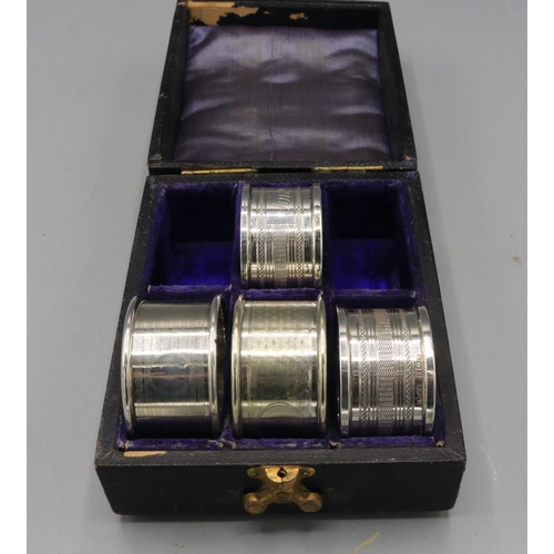 730 - Two silver napkin rings by Henry Griffith & Sons Ltd, Birmingham, 1974; silver napkin ring by Edwin ... 