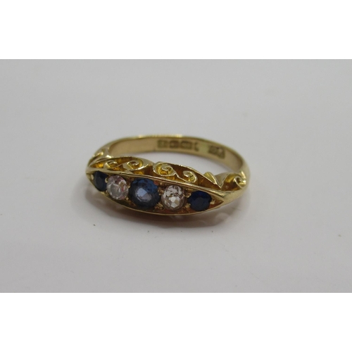 12 - 18ct yellow gold five stone ring set with sapphires and diamonds, stamped 18, 3.42g