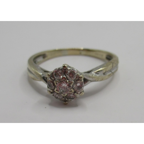 25 - 18ct white gold ring set with diamond floral cluster, stamped 750, 2.41g