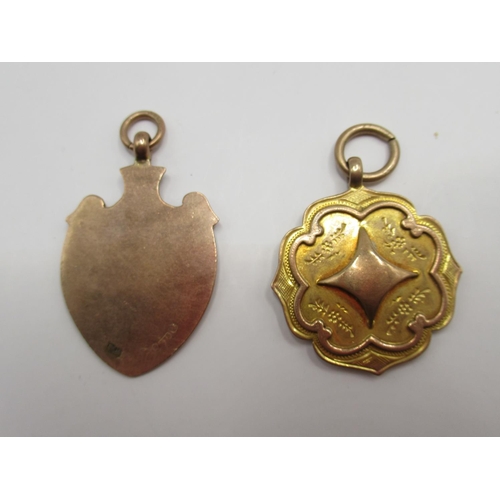 160 - Two 9ct yellow and rose gold fobs, both stamped 375, 10.19g