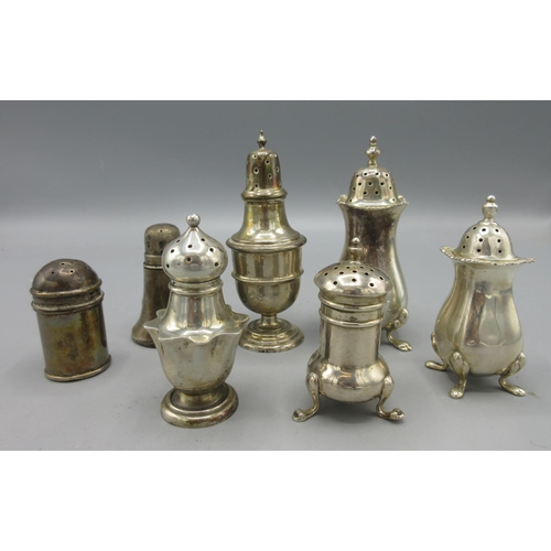 170 - Victorian silver pepperette on pedestal foot with unusual wavy skirt and pierced top by Edward Barna... 