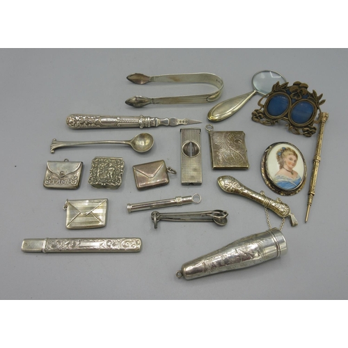 177 - Silver cheroot holder with engraved foliate decoration, three silver stamp cases stamped 925, silver... 