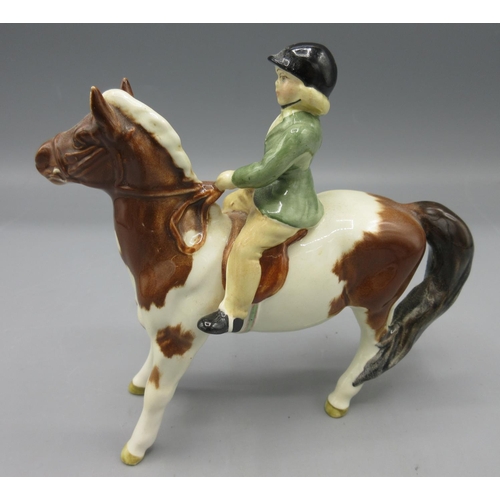 404 - Beswick Girl on Skewbald Pony, model no. 1499, H13cm