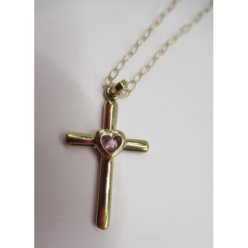 351 - 9ct yellow gold cross pendant set with purple stone, on 9ct yellow gold chain, stamped 375, and a qu... 