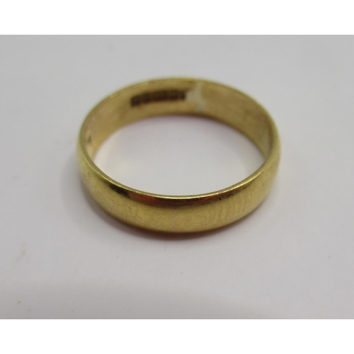 38 - 22ct yellow gold wedding band, stamped 22, size K, 2.83g