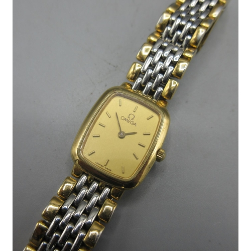 734 - Omega DeVille ladies stainless steel and gold plated quartz wristwatch on matching bracelet, signed ... 