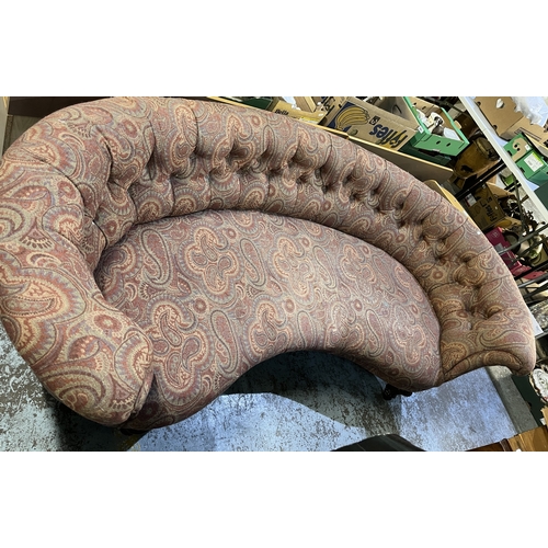 753 - Victorian curved button back sofa, upholstered in red paisley pattern fabric on fluted rosewood legs... 