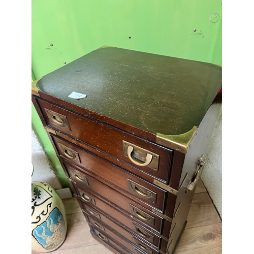 750 - Campaign style chest of seven drawers with recessed brass handles, W40cm D31cm H94cm