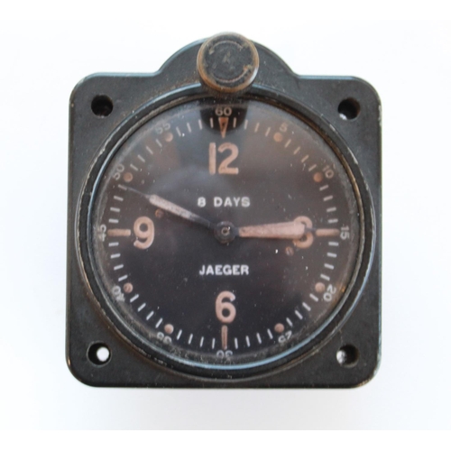 1369 - WWII 8 Day cockpit clock by Jaeger Watch Co USA. In black metal case. Stamped with AM and crown. Typ... 