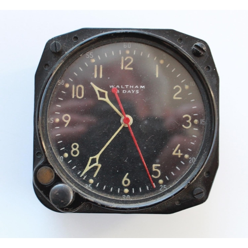 1361 - 8 Day cockpit clock by Waltham. Luminous hour and minute hands, red second hand. Good working order