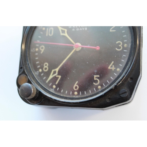 1361 - 8 Day cockpit clock by Waltham. Luminous hour and minute hands, red second hand. Good working order