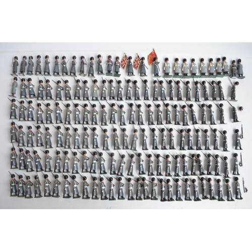 78 - Collection of metal Guardsmen model soldier figures in greatcoats to include W. Britain's, most/all ... 