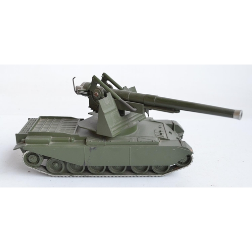 82 - Four metal armour models to include an original W. Britain's Centurion Tank with 155mm gun, a recast... 