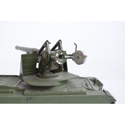 82 - Four metal armour models to include an original W. Britain's Centurion Tank with 155mm gun, a recast... 