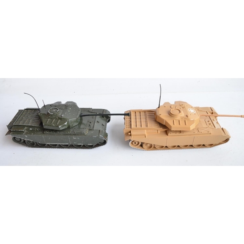 82 - Four metal armour models to include an original W. Britain's Centurion Tank with 155mm gun, a recast... 