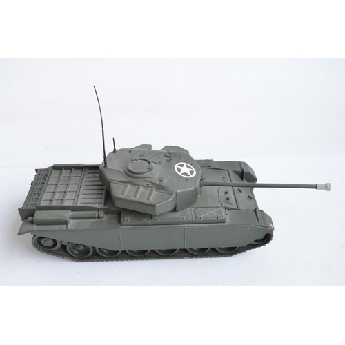 82 - Four metal armour models to include an original W. Britain's Centurion Tank with 155mm gun, a recast... 