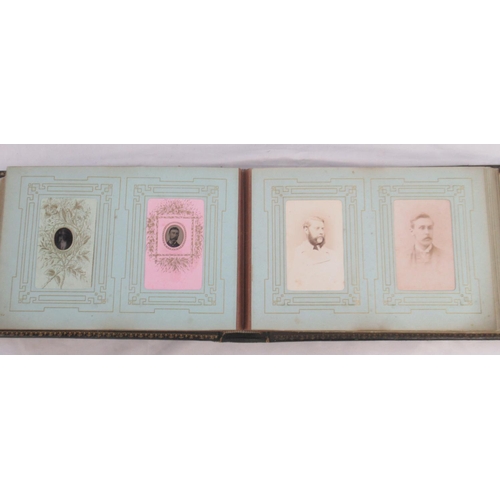  Three Victorian photograph albums containing period carte de visite portraits and cabinet cards