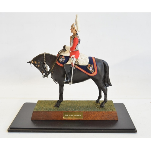 100 - Two well painted cast metal mounted soldier models in clear acrylic display cases to include a 17th ... 