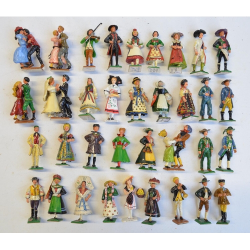 101 - Collection of cast metal civilian figures to include German folk wedding (unknown maker) and Germans... 