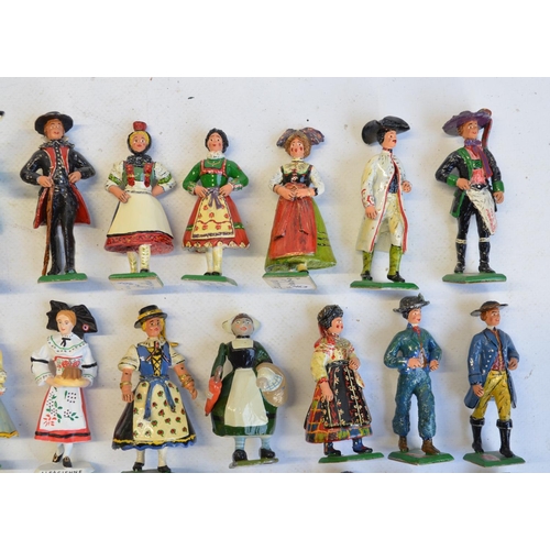 101 - Collection of cast metal civilian figures to include German folk wedding (unknown maker) and Germans... 