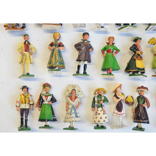 101 - Collection of cast metal civilian figures to include German folk wedding (unknown maker) and Germans... 