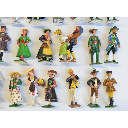 101 - Collection of cast metal civilian figures to include German folk wedding (unknown maker) and Germans... 