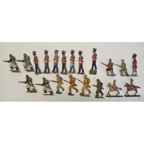 105 - Collection of metal flats and pressed tin figures to include 100mm mounted kettle drummer and trumpe... 