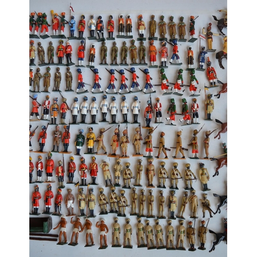 88 - Collection of metal soldier figures, mostly British Indian Army to include W. Britain's, mostly repa... 