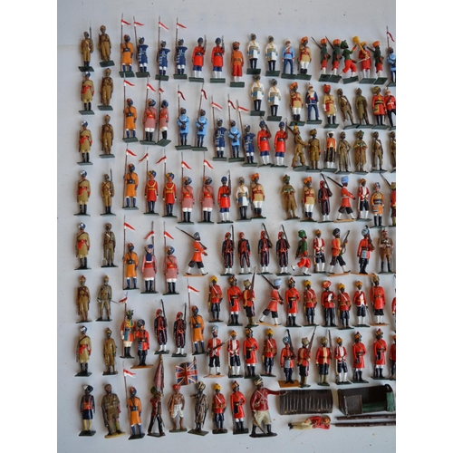 88 - Collection of metal soldier figures, mostly British Indian Army to include W. Britain's, mostly repa... 