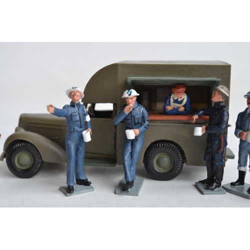 93 - Naafi van with server and 12 other metal figures to include W. Britain's and Rank And File, figure h... 