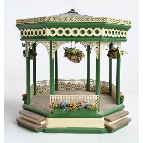 95 - Cast resin bandstand with army band from Soldier Soldier