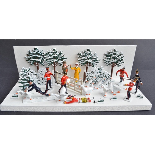 97 - Two charming winter themed dioramas, all figures from Replica to include soldiers having a snowball ... 