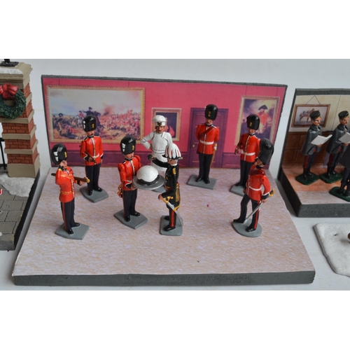 98 - Collection of painted metal soldier and civilian model figures to include Britain's singing Lancers ... 