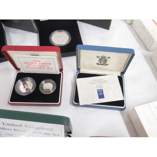 264 - Collection of silver proof coins to inc. 21 Royal Mint Silver Proof 50ps from Beatrix Potter, Paddin... 