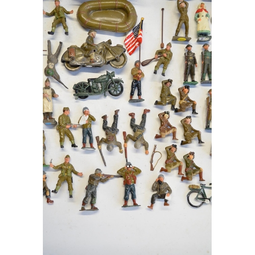 114 - Collection of generally World War II themed soldier figures (mostly metal 54mm tall), various manufa... 