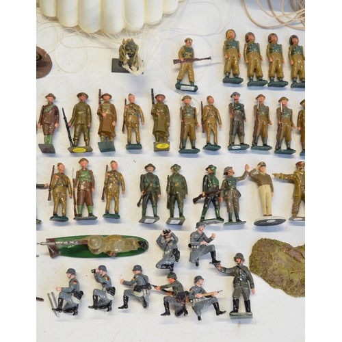 114 - Collection of generally World War II themed soldier figures (mostly metal 54mm tall), various manufa... 