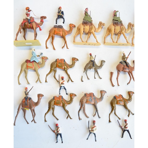 125 - Collection of competently home painted metal camels and camel riders plus 4 standing Arab soldiers o... 