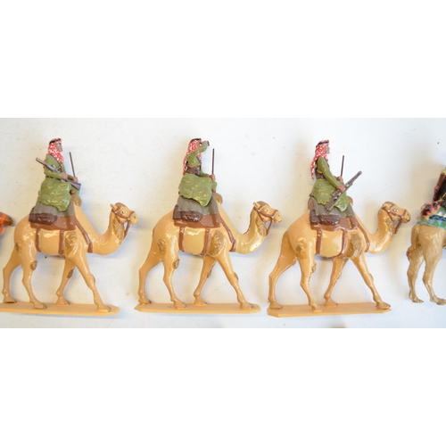 125 - Collection of competently home painted metal camels and camel riders plus 4 standing Arab soldiers o... 