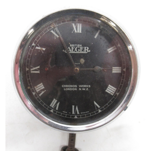 1531 - British Jaeger, Chronos Works, London, 8 day chrome car clock, signed black Roman dial, no. 490885, ... 