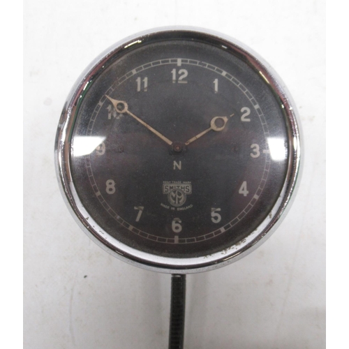 1533 - Smiths 8 day chrome car clock, signed black Arabic dial, no. X38185/748910 and similar Smiths car cl... 