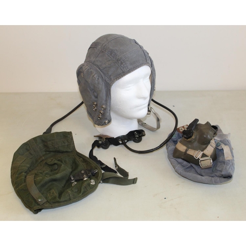 1461 - Three mid-20th century RAF canvas flying helmets, one with original headset and one with face mask. ... 