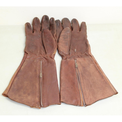 1467 - Two pairs of mid-20th century leather flying gloves. To include a brown pair of RAF flying gloves st... 