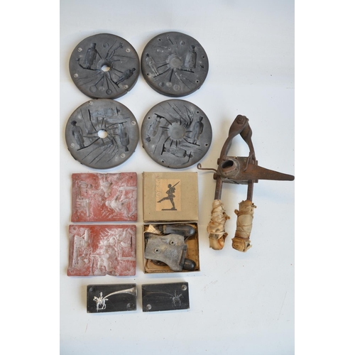 140 - Collection of hand pour model figure moulds to include an extremely rare and original W. Britain's C... 