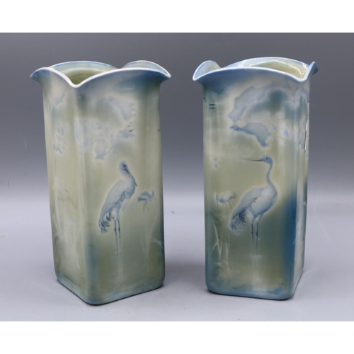 328 - Pair of Royal Worcester Sabrina Ware vases, blue and green glaze with wading storks, H19cm (2)