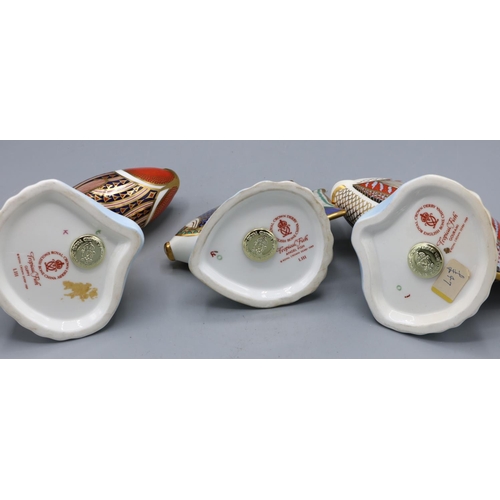 329 - Three Royal Crown Derby Tropical Fish paperweights, all with gold stoppers, max. H13cm