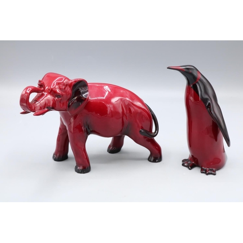 350 - Royal Doulton flambe elephant and penguin, max. H15.5cm (2)