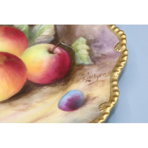 359 - Royal Worcester plate decorated with fruit, painted by T. Lockyer, signed, D22.5cm, A/F