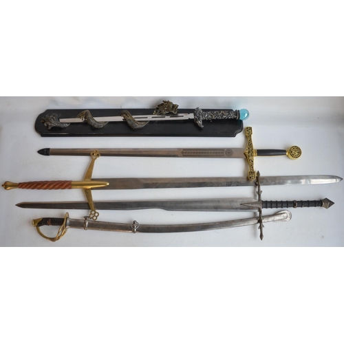 1291 - Five full size replica swords to include a US Civil War style cavalry sword, Excalibur, Sauron's swo... 