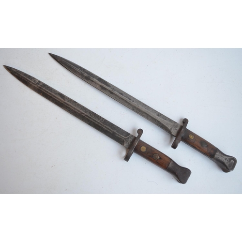 1293 - Two Lee Metford bayonets, one stamped 12/93 Sanderson Sheffield, the other indistinct (VR 2/91?), ov... 