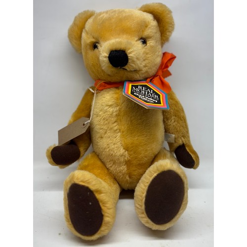 314 - Chad Valley Chiltern blonde mohair teddy bear with orange ribbon and original paper tag, H45cm